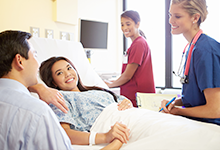 couple and medical staff