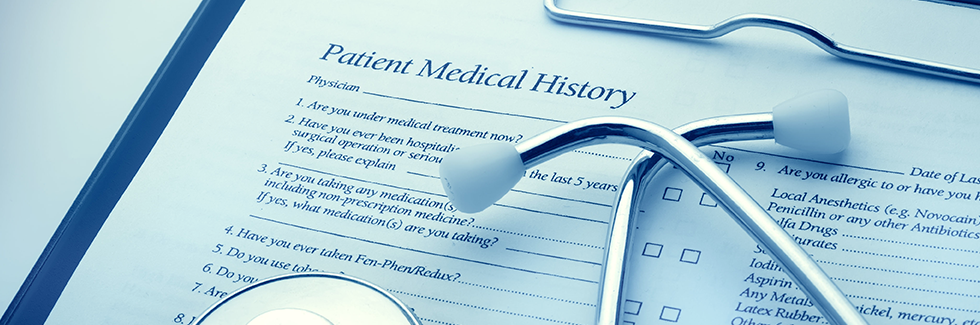 stethoscope over medical file