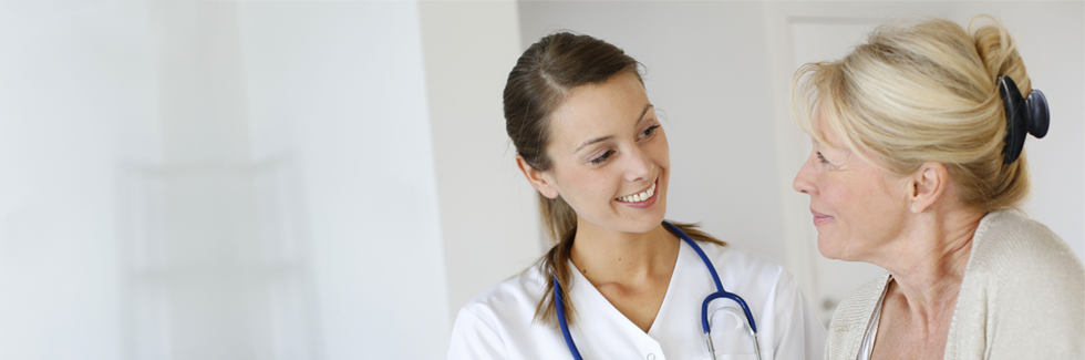 Nurse taking care of an old lady